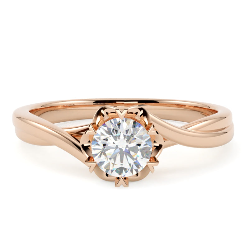 Piękny pierścionek z różowego złota z brylantem